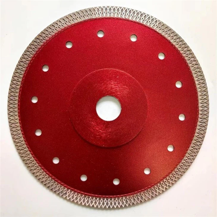 Mesh rim porcelain tile cutting blade